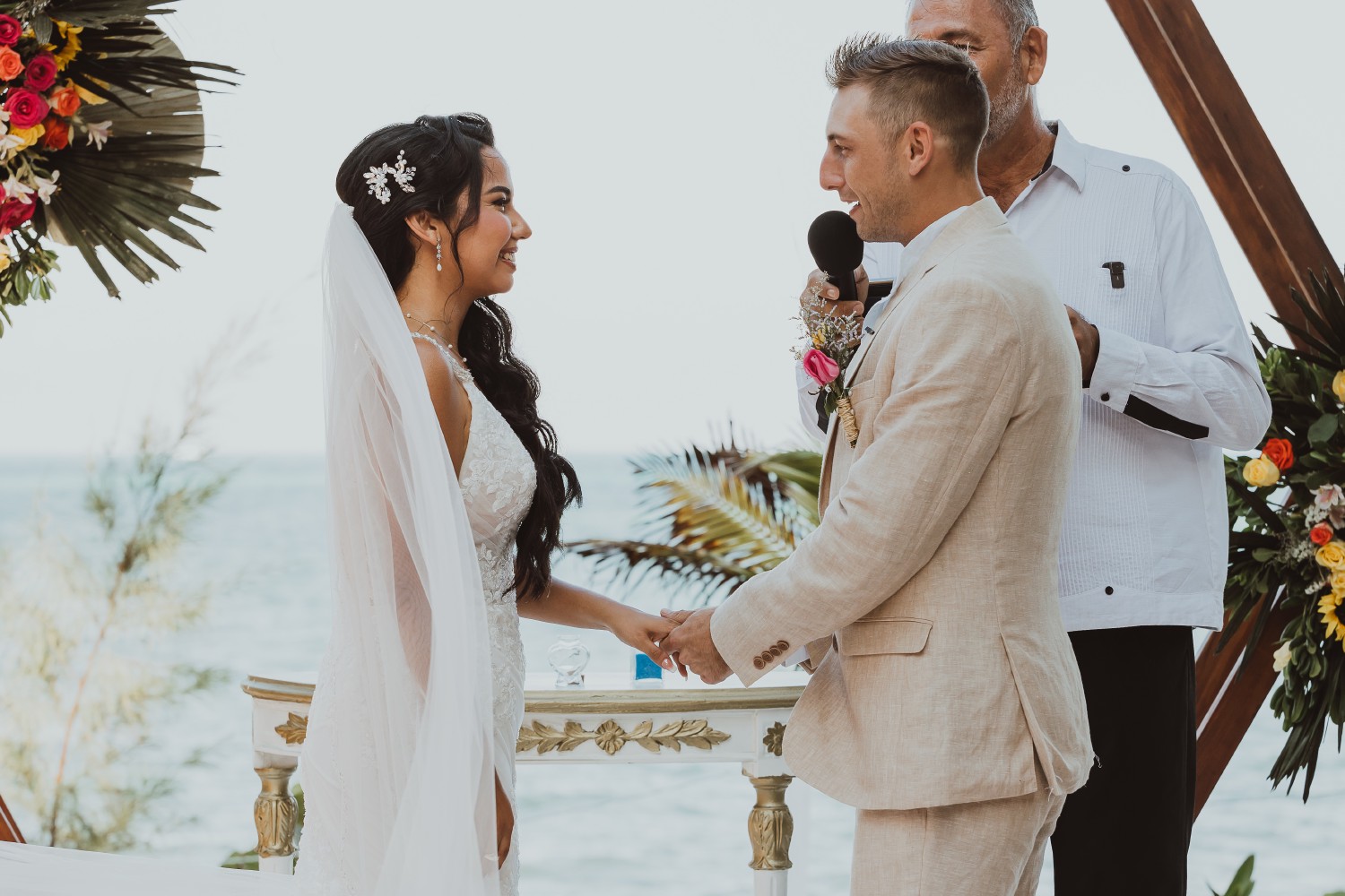 Bride and groom at Ocean Weddings Cancun.
