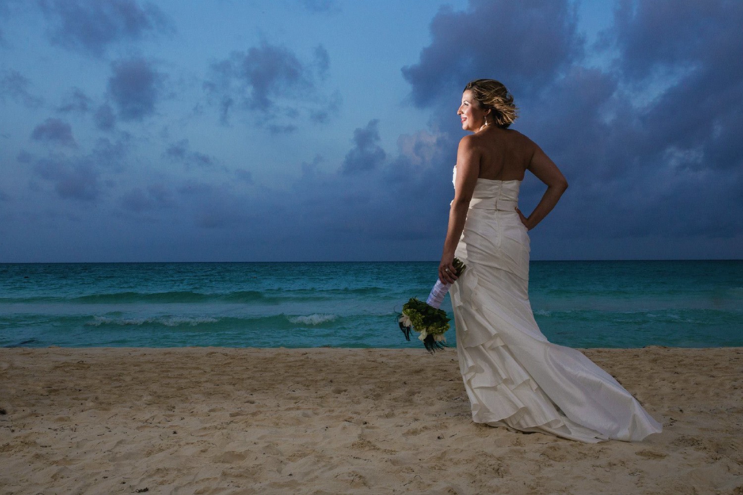 Bride and groom at Playacar Palace.